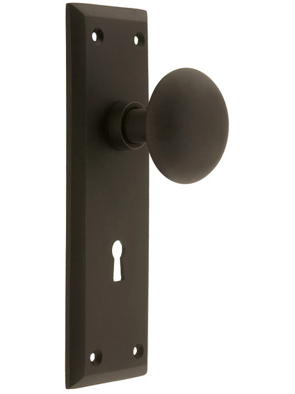 New York Mortise Lock Set With Round Brass Knobs in Oil Rubbed Bronze.
